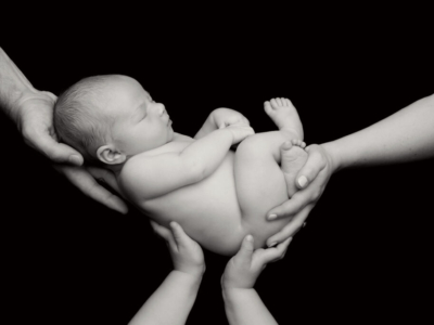 Newborn with hands